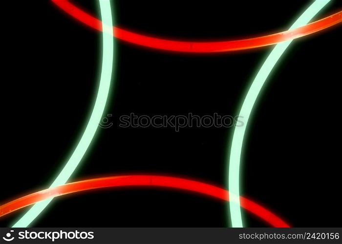 illuminated red green curve lights black background
