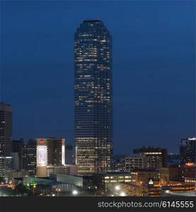 Illuminated skyscraper at night, Victory Park, Dallas, Texas, USA
