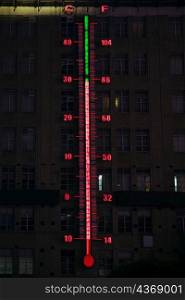 Illuminated thermometer neon on a building, Nanjing Road, Shanghai, China