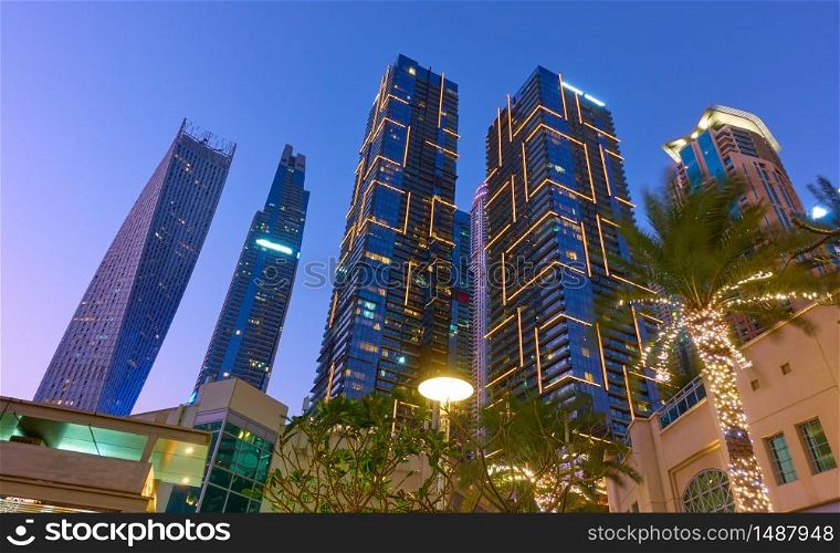 Illuminated towers of Dubai Marina district at night, United Arab Emirates