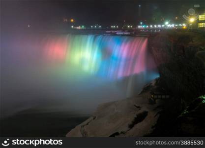 Illumination light at Horseshoe Falls viewed from Table Rock in Queen Victoria Park in Niagara Falls at night, Ontario, Canada