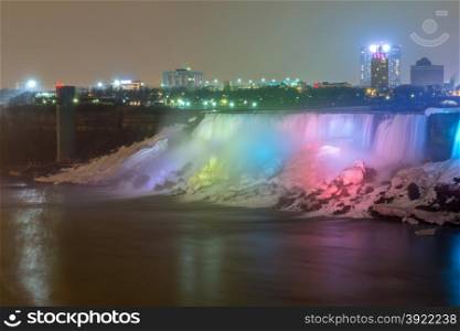 Illumination light of american Falls as viewed from Table Rock in Queen Victoria Park in Niagara Falls at night, Ontario, Canada
