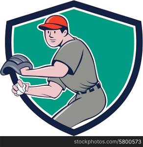 Illustration of a american baseball player pitcher outfilelder throwing ball set inside shield crest on isolated background done in cartoon style. . Baseball Player OutFielder Throwing Ball Crest Cartoon