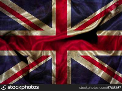 Illustration of a Union Jack flag with folds and creases and grunge effect