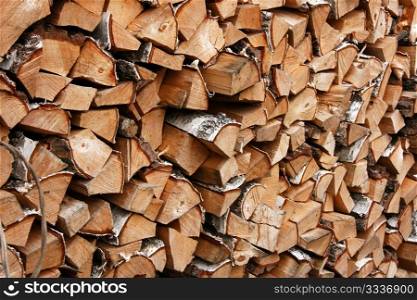 Image about a pile of birch firewood. close-up