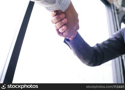 Image business mans handshake. Business partnership meeting concept.