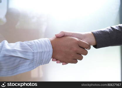 Image business mans handshake. Business partnership meeting concept.