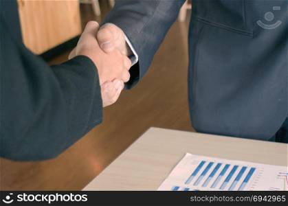 Image business mans handshake. Business partnership meeting concept