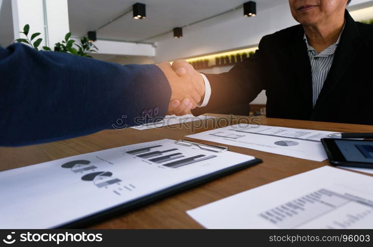 Image business mans handshake. Business partnership meeting concept.