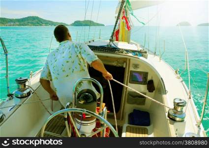 Image of a beautiful yacht in the open sea on a sunny day