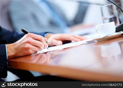 Image of a business work place with papers on the table