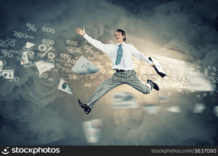 Image of a businessman jumping high against financial background