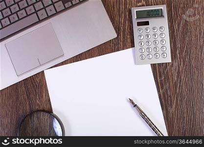 Image of a businessman workplace with papers