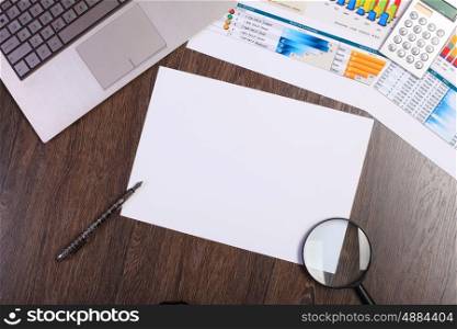 Image of a businessman workplace with papers