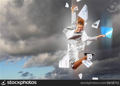Image of a businesswoman jumping high against financial background