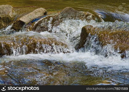 image of a little waterfall in the stream