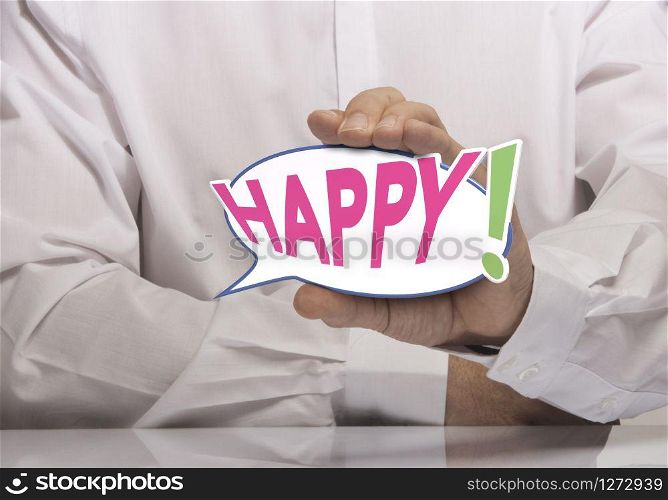 Image of a man hand holding speech balloon with the text happy, white shirt. Concept of happiness or happy customer.. Happy Concept