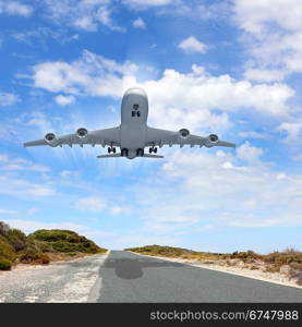 Image of a white flying passenger plane