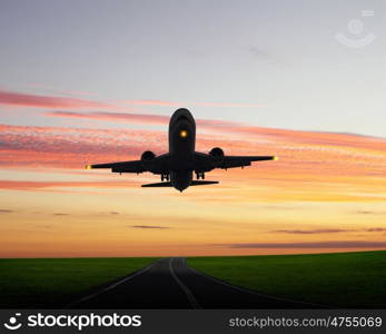 Image of airplane in blue cloudy sky