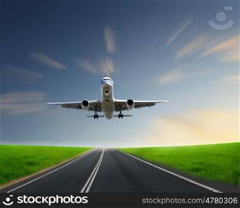 Image of airplane in blue cloudy sky
