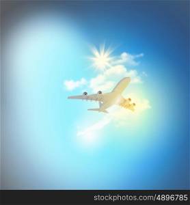 Image of airplane in sky. Image of flying airplane in clear sky with sun at background