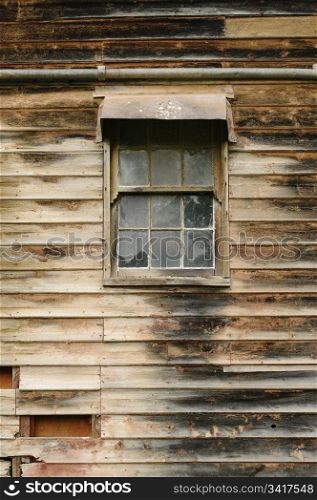 image of an old grungy wooden wall and window