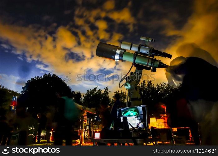 Image of astronomical observations at the telescope. Shooting Location: Tokyo metropolitan area