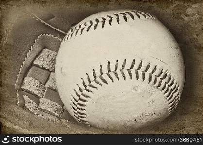 Image of baseball and catchers glove in vintage retro grunge stlye with added aged effects to give feel of nostalgia