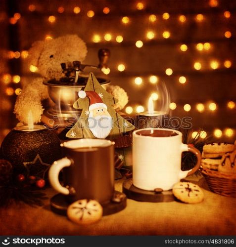 Image of beautiful Christmastime still life, traditional gingerbread with coffee cups on the table, teddy bear with decorative wooden Christmas tree adorn holiday dessert, New Year greeting card