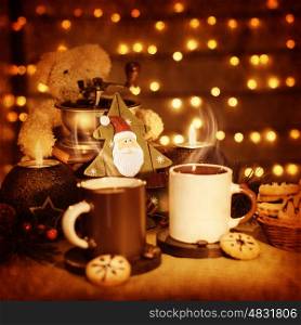 Image of beautiful Christmastime still life, traditional gingerbread with coffee cups on the table, teddy bear with decorative wooden Christmas tree adorn holiday dessert, New Year greeting card