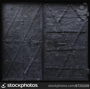 Image of black iron gothic security doors.