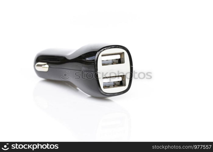 Image of black USB car charger isolated on white background.