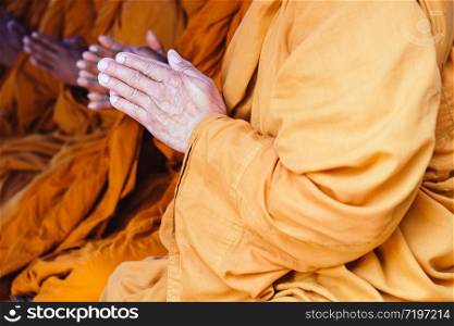 image of Buddhist monks praying