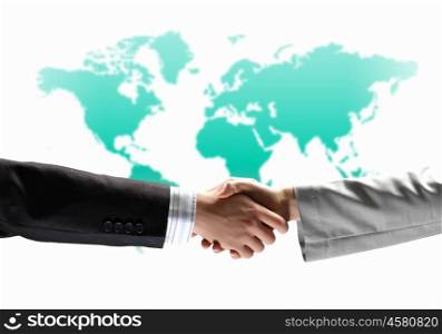 image of business handshake. business handshake against white background with map image