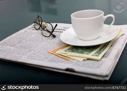 Image of business table with a cup of coffee and notebook