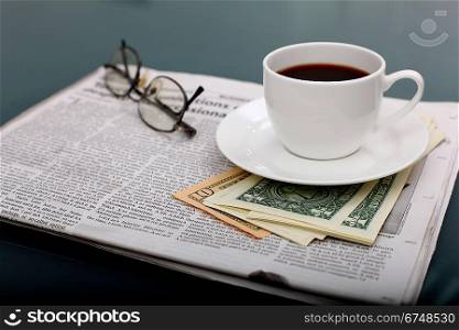 Image of business table with a cup of coffee and notebook
