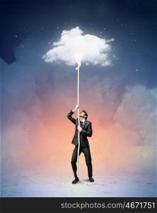 Image of businessman climbing rope. Image of businessman climbing rope attached to cloud