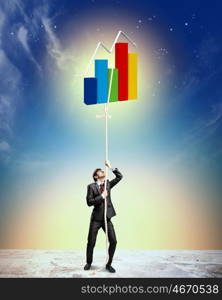 Image of businessman climbing rope. Image of businessman climbing rope attached to diagram aloft