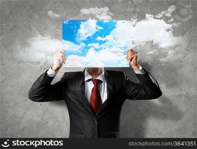 Image of businessman holding message board. Conceptual photo