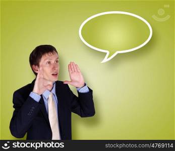 Image of businessman in suit talking and shouting