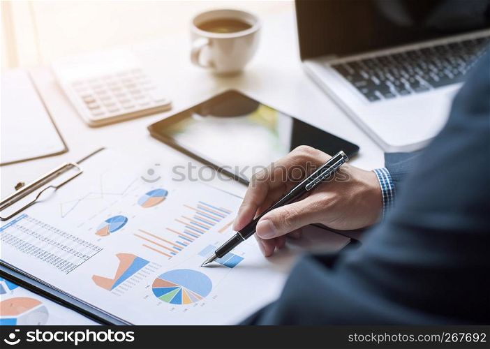 Image of businessman working on document data at the office