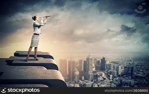 Image of businesswoman looking in telescope standing a top of building