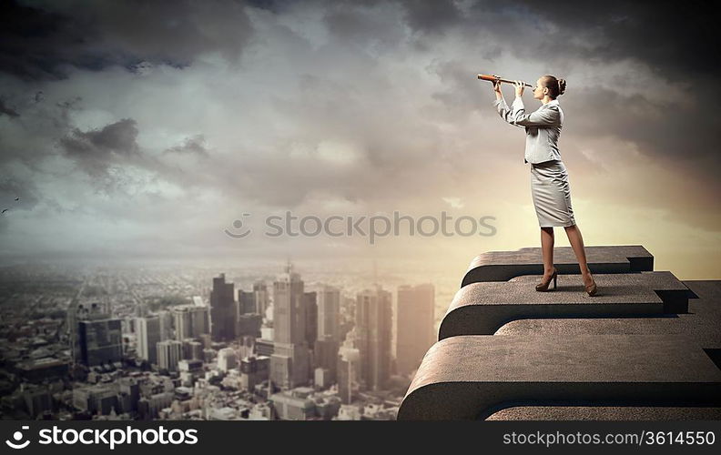 Image of businesswoman looking in telescope standing a top of building