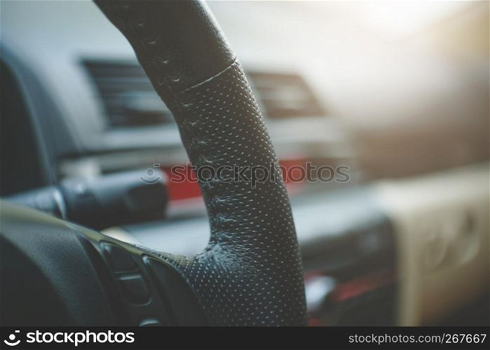 image of car interior selected focus on steering wheel