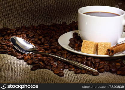 Image of coffee beans and white cup