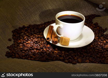 Image of coffee beans and white cup