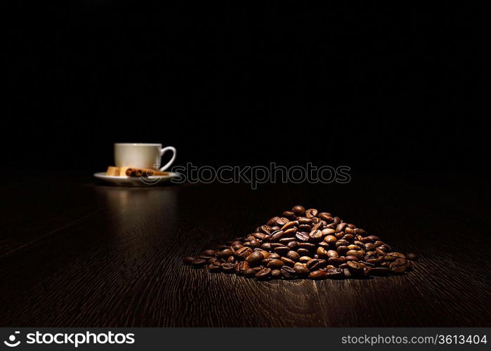 Image of coffee beans and white cup