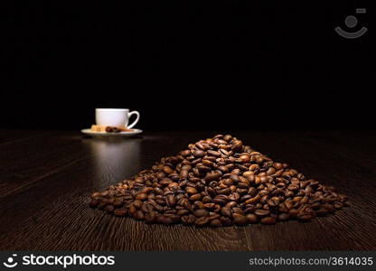 Image of coffee beans and white cup