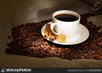 Image of coffee beans and white cup