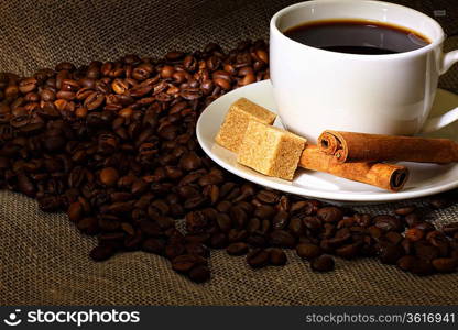 Image of coffee beans and white cup